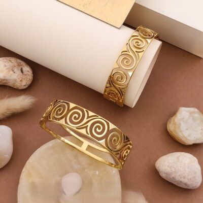 Gold Swirl-Motif Bracelets – Artistic Elegance