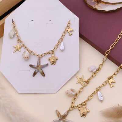 Ocean Charm Gold Necklace – Starfish, Dolphin, Turtle & Seashell Accents